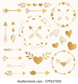 Set of golden arrows, hearts, frames. Hand drawn. Vector. Isolated.