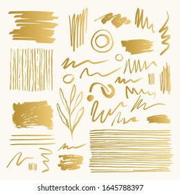 Set of golden brush and marker doodle paints. Vector isolated illustration.