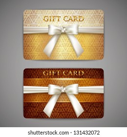 set of golden gift cards with white bows