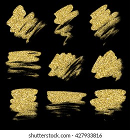 Set of golden glitter spots with halftone effect. Golden sparkling brush strokes on black background.