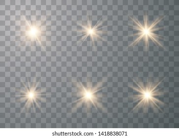 Set of golden glowing lights effects isolated on transparent background. Sun flash with rays and spotlight. Special effect isolated on transparent background.