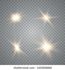 Set of golden glowing lights effects isolated on transparent background. Sun flash with rays and spotlight. Glow light effect. Star burst.