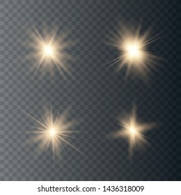 Set of golden glowing lights effects isolated on transparent background. Sun flash with rays and spotlight. Glow light effect. Star burst.