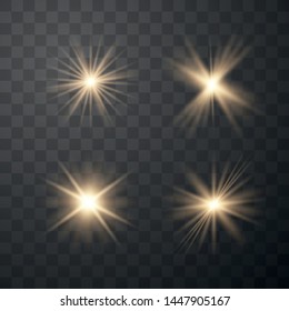 Set of golden glowing lights effects isolated on transparent background. Sun flash with rays and spotlight. Glow light effect.