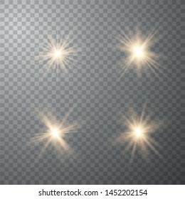 Set of golden glowing lights effects isolated on transparent background. Sun flash with rays and spotlight. Glow light effect.