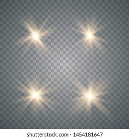 Set of golden glowing lights effects isolated on transparent background. Sun flash with rays and spotlight. Glow light effect.