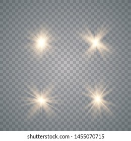 Set of golden glowing lights effects isolated on transparent background. Sun flash with rays and spotlight. Glow light effect.