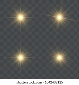 Set of golden glowing lights effects, on a transparent background. Flash of the sun with rays and a searchlight. Glow effect. The star burst with brilliance.
