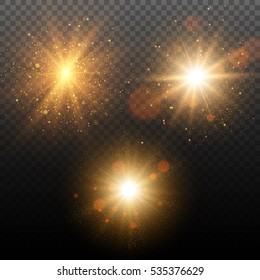 Set of golden glowing lights effects isolated on transparent background. Star burst with sparkles.