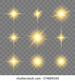 Set of golden glowing star. Vector light effects on the transparent background.