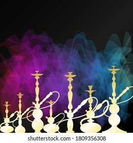 Set of golden hookahs on the background of beautiful color smoke	