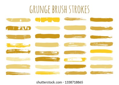 Set of golden ink vector stains. Grunge brush stroke collection isolated on white - Vector
