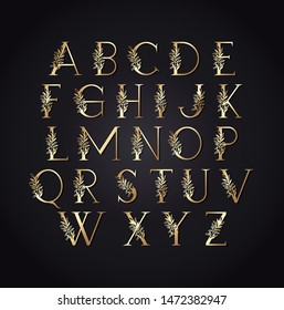 set of golden letters with leafs