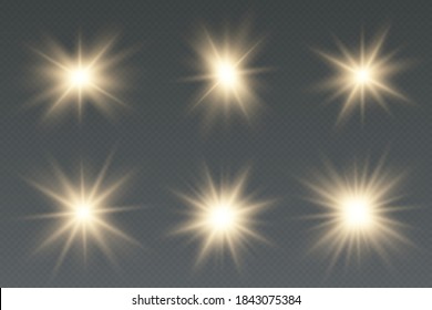 Set of golden light effects on a transparent background.  Light effect Bright Star. Beautiful light for illustration.