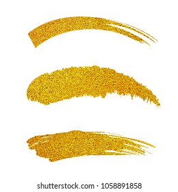 Set of golden paint brushes on white background.Vector illustration.