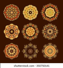 Set of golden - red decorative rosettes