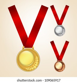 Set of golden, silver and bronze medals
