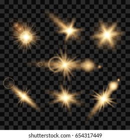 Set Golden sparkling light trails. Lens flare effect on transparent background