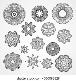 Set of gothic circle ornament roses and stars in vector, isolated black on white