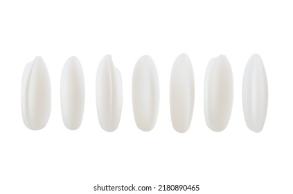 Conjunto de granos de arroz blanco sobre fondo blanco.