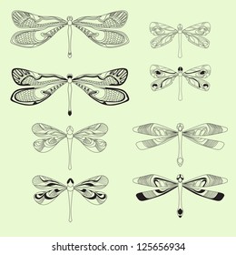 Set of graphic dragonflies. Vector illustration
