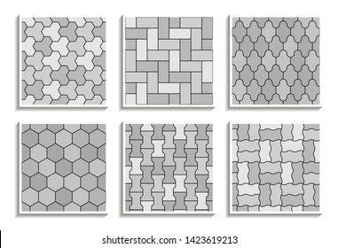 Set of grayscale seamless pavement textures. Black-and-white repeating patterns of street tiles