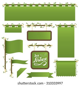 set of green banners, flags and ribbons with foliage decoration, isolated on white