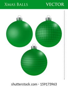 A set of green Christmas balls with different ornaments