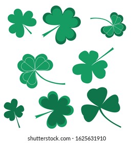 Set of green clover leafs isolated on white background. Vector flat illustration. Elements for decoration.