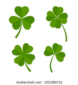 Set of green clover leaves isolated on white background