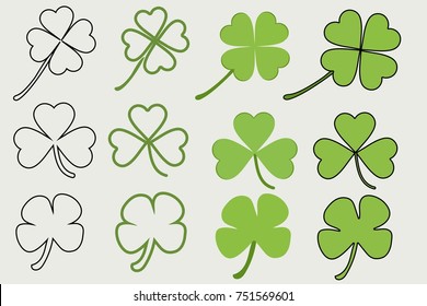 Set of green clovers. Vector illustration. EPS 10. Green clovers in simple cartoon style.