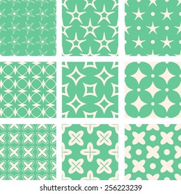 Set of green geometrical seamless patterns. Simple shapes, pastel colors.