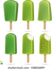 Set of green ice cream pops on wooden sticks. 