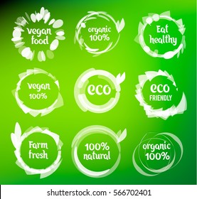 Set of green labels and badges with leaves for organic, natural, bio and eco friendly products isolated on white background