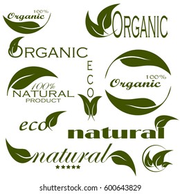 Set of green labels and badges with leaves for organic, natural, bio and eco friendly products isolated on white background
