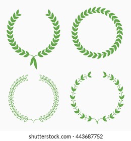 Set of green laurel wreaths on white background. Vector illustration