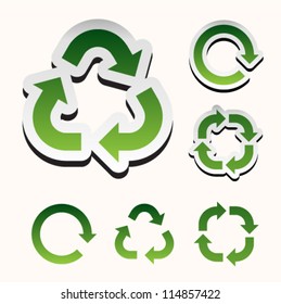 Set of green recycle arrow on white