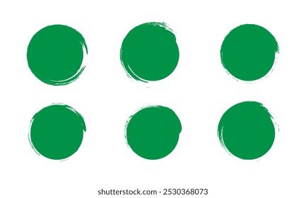 Set of green round brush painted grunge circle.