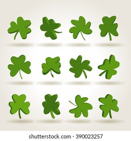 Set of green separated shamrock leaves, symbol of St. Patrick's Day, vector illustration