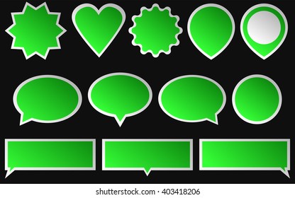 Set of green stickers isolated on dark background. Various shapes of a green stickers.