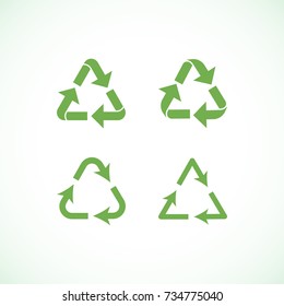 Set of green triangular arrows.. Isolated icons