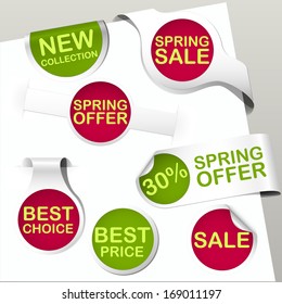 set of green and violet purple colored paper bookmarks and labels with promotion text for spring sale
