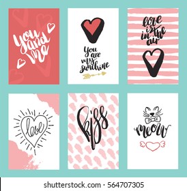 Set of greeting cards for Valentine's Day. Vector collection with brush lettering and hand written elements. White and pink color labels for your design and invitation.