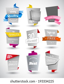Set of grey paper labels with colored parts. 
