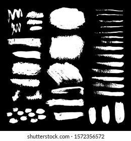 set of grunge black paint, ink brush strokes. brush strokes collection. Dirty grunge artistic design elements, backgrounds, textures, brushes.