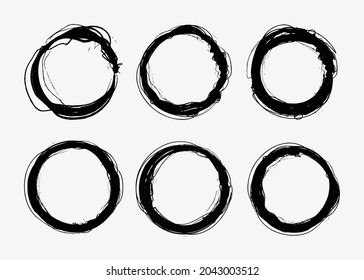 Set of grunge black round frames.