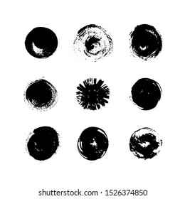 Set of grunge black round paint spots with texture. Different brush strokes. Vector illustration. Can be using for web design, logos, banners, greeting cards, leaflets, posters, clothing.