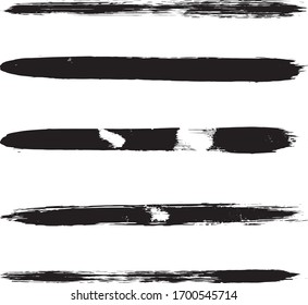 A set of grunge brushes. Abstract strokes of black paint with a dry brush. Blots of ink