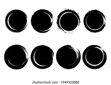 Set of grunge circles from brush strokes. Design element for poster, emblem, sign, logo. Vector illustration