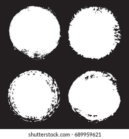 Set of grunge circles. Distressed round shapes.